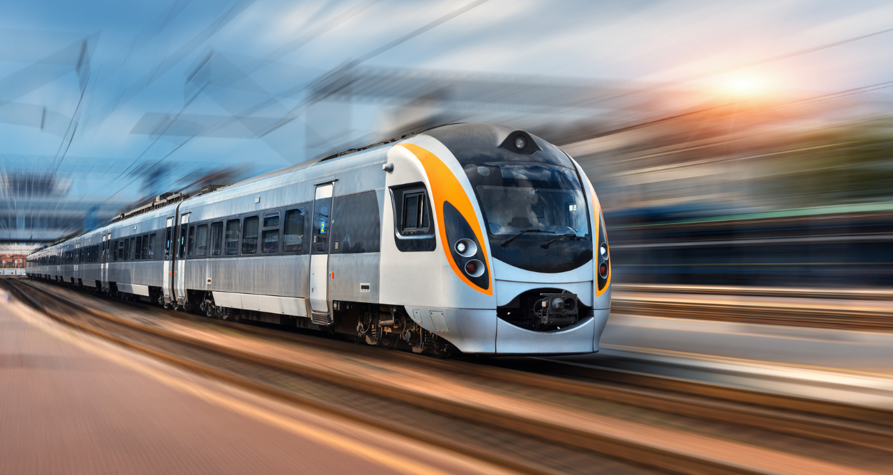 Modern passenger train operating on electrified rail infrastructure.
