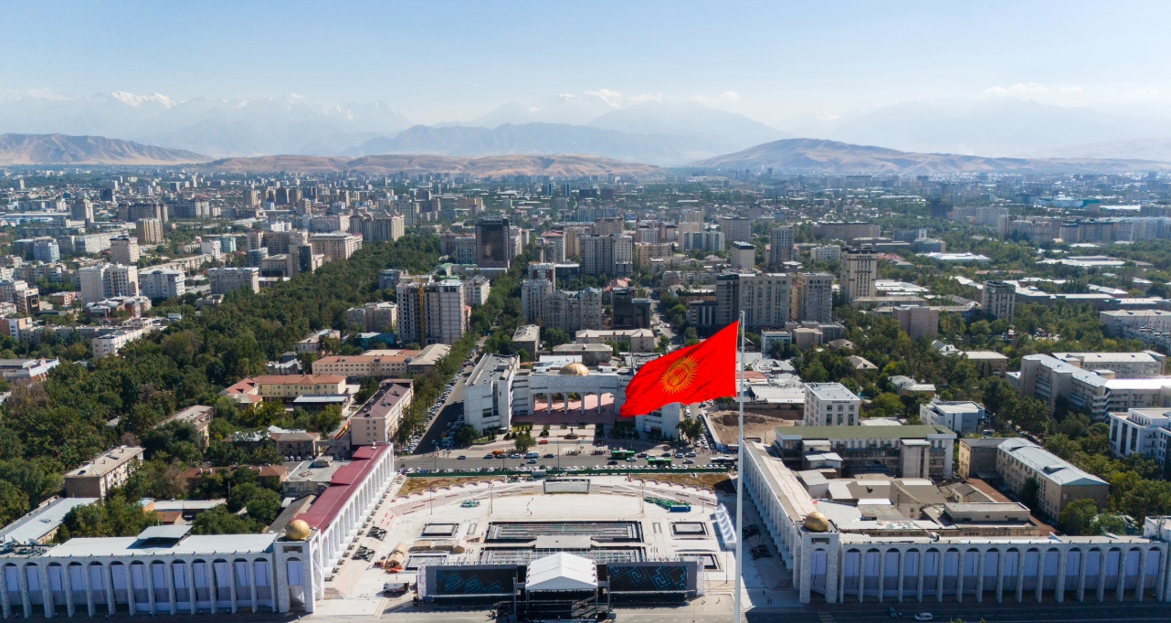 Aerial view of Ala-Too Square featuring a Kyrgyzstan national flag