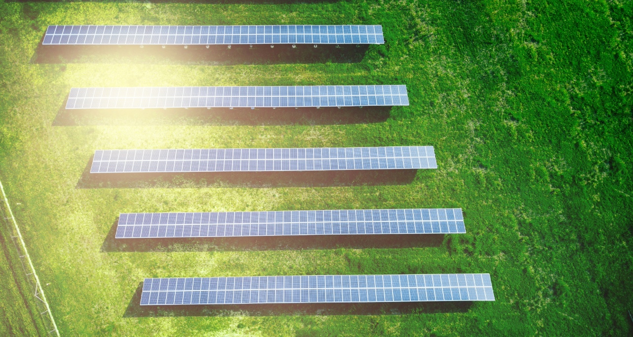 Aerial view of solar panels on a sunny day. Power farm producing clean energy in Greece