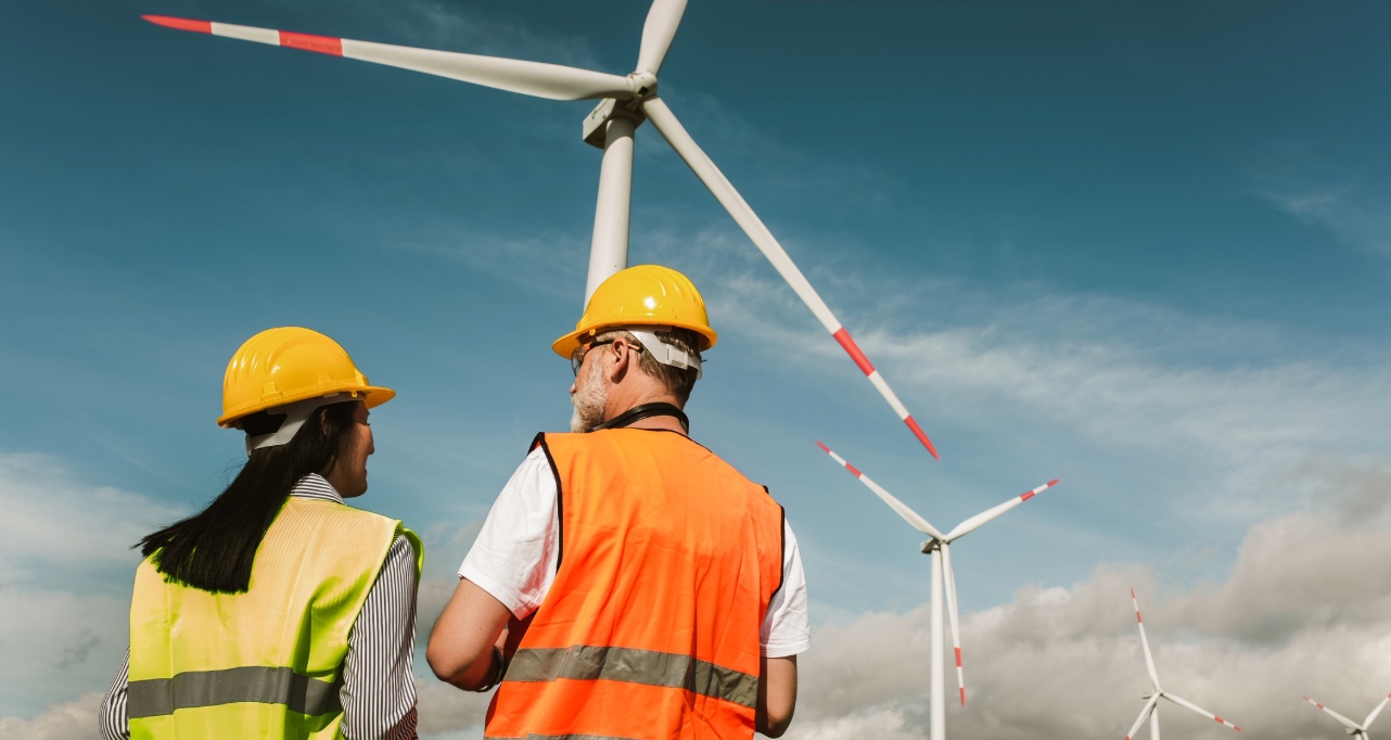 Windmill engineers inspection and progress check wind turbine