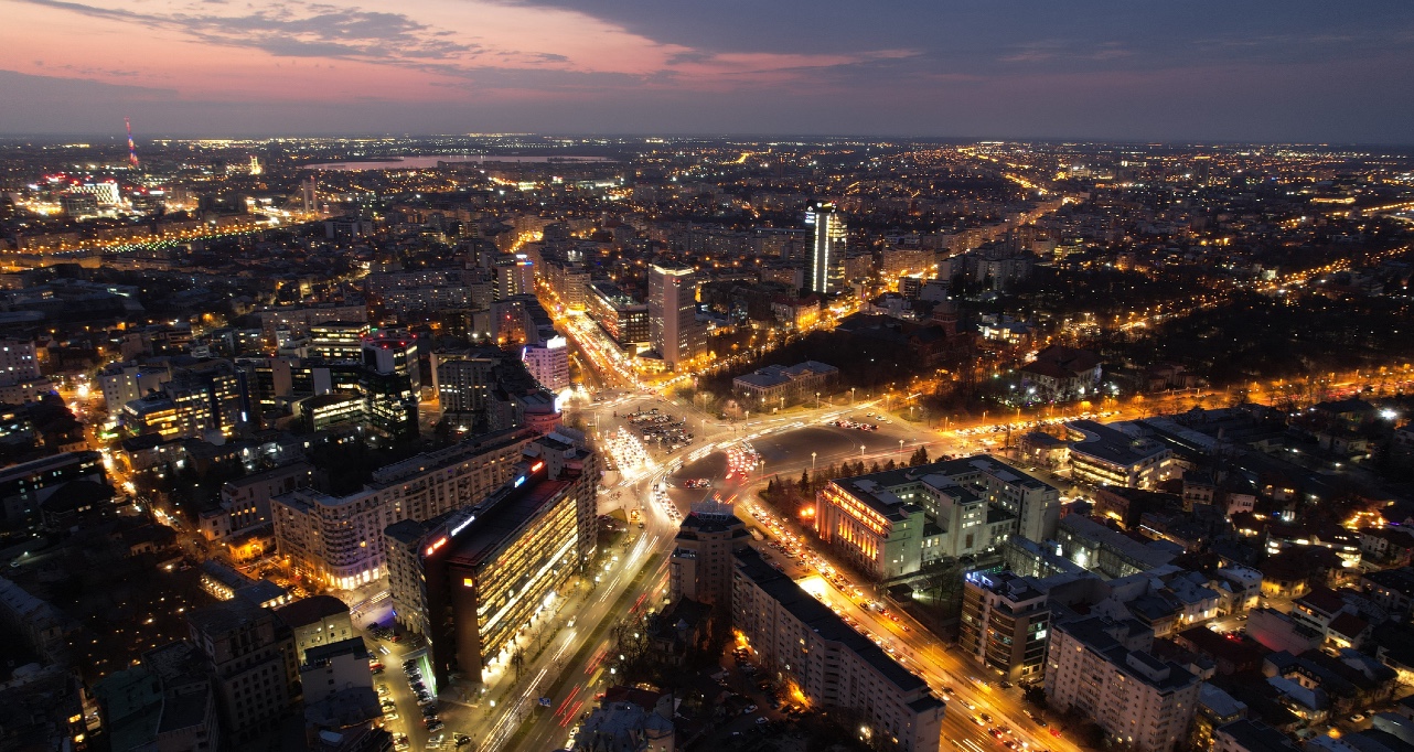 An aerial view of cityscape in Bucharest, Romania at night