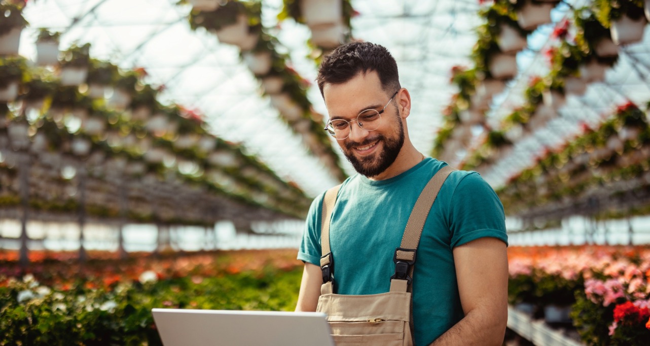 A male botanist in his greenhouse