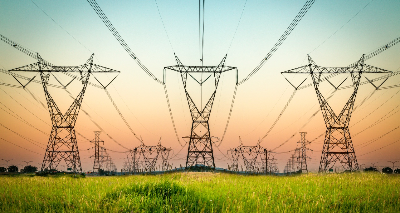 Power lines and sunset landscape