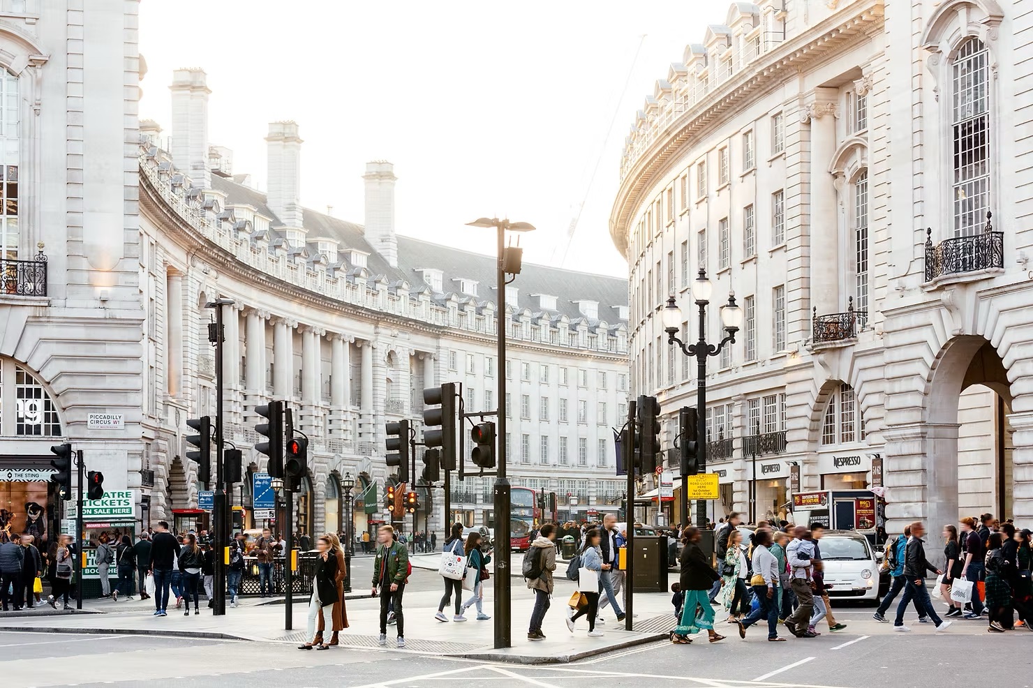 People crossing the street in London.